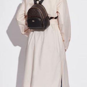 Coach Mini Court Backpack In Signature Canvas in Good Condition.